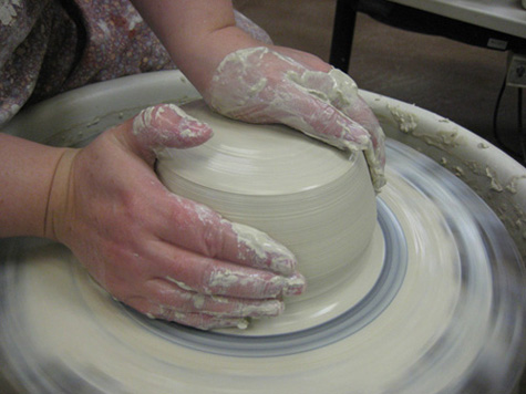 An artists molds a piece of pottery at the Northern Colorado Potters Guild. The potters guild, along with 34 other studios, will be open this weekend for public viewing. (Photo courtesy of the Northern Colorado Potters Guild). 