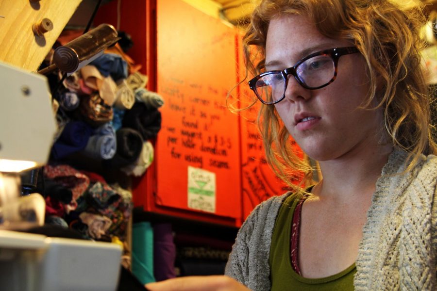 CSU sophomore Jennie Maydew sews wristbands for this weekends Hammer Bash. All proceeds from the concert will support the many community projects at Hammer Time!, located in Fort Collins.