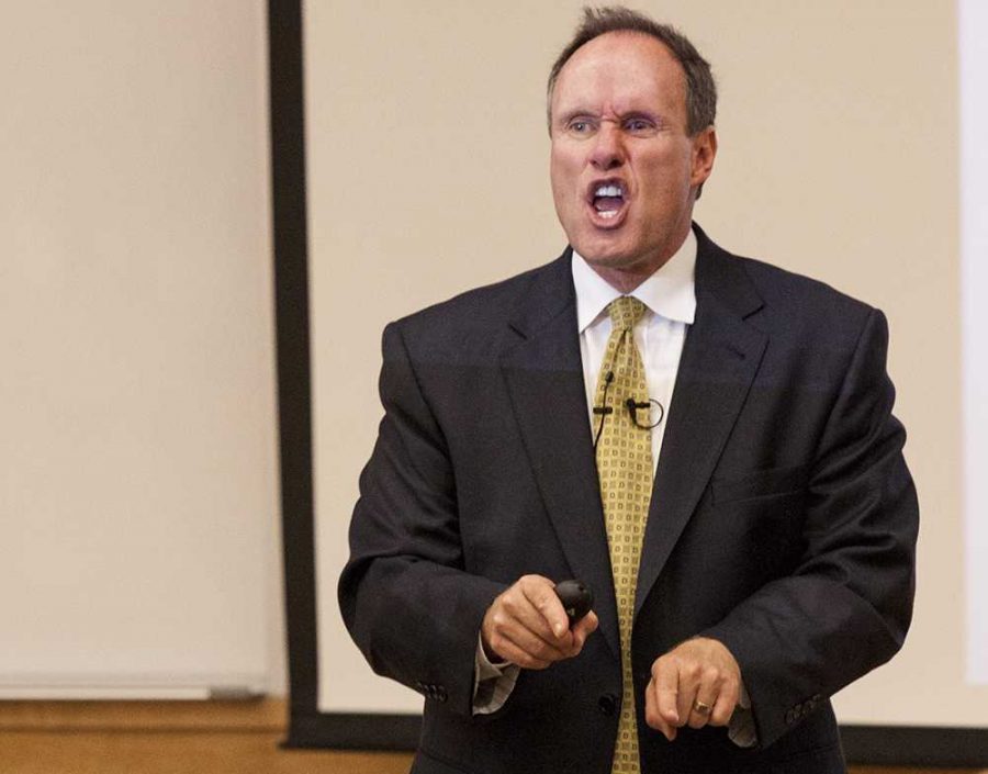 Best-selling author Stephen M.R. Covey drills in the importance of truthfulness in business practice to students in Clark A101 Friday. This was the first year the business school has put on a business ethics symposium.