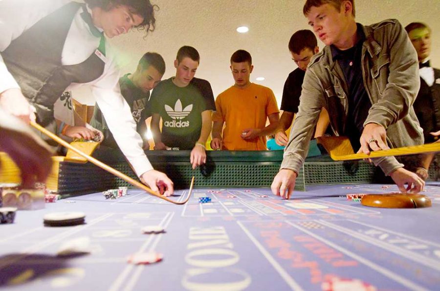 From left, Billy Mann, Eric Urbina, Brady Demmon, Jake Loughridge, Jake Wolynski and Alex Nuckols play at gambling night in the CSU Aspen Grill for Ramapalooza Friday. The Lory Student Center was filled with activities and games as part of the Ram Welcome weekend.