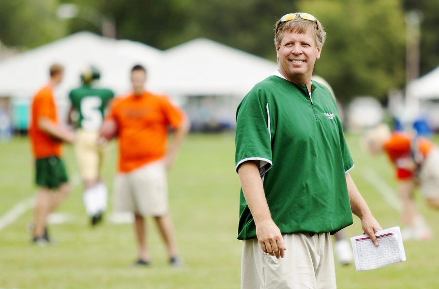 Coach Jim McElwain walks across the field during practice on Friday, Aug. 24. The Rocky Mountain Showdown will be McElwain's first regular season game as a head coach at CSU.