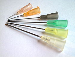 A group of six hypodermic needles. Photo courtesy of Wikipedia.
