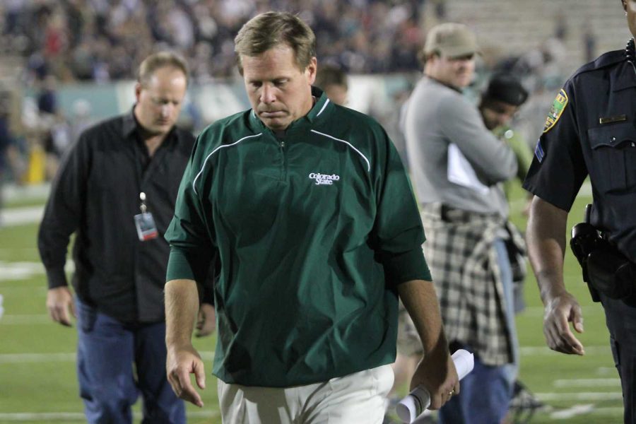 Head coach Jim McElwain walks off the field after Saturday nights loss to Utah State at Hughes Stadium. The Rams were outplayed on both sides of the ball and lost to the Aggies 30-19.