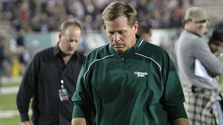 Head coach Jim McElwain walks off the field after Saturday nights loss to Utah State at Hughes Stadium. The Rams were outplayed on both sides of the ball and lost to the Aggies 30-19.