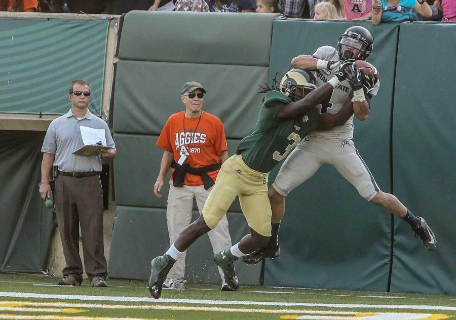 Cornerback Shaq Bell (3) breaks up a touchdown pass in the first quarter of Saturdays game at Hughes Stadium against Utah State. Despite an interception and fumble return from bell, the Rams fell short to the Aggies 30-19.