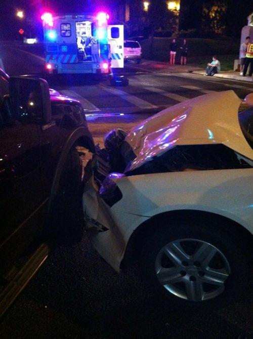 A white Chevy impala, part of the RamRide fleet, sustained front end damage following a collision with a black Ford pickup on Saturday night.