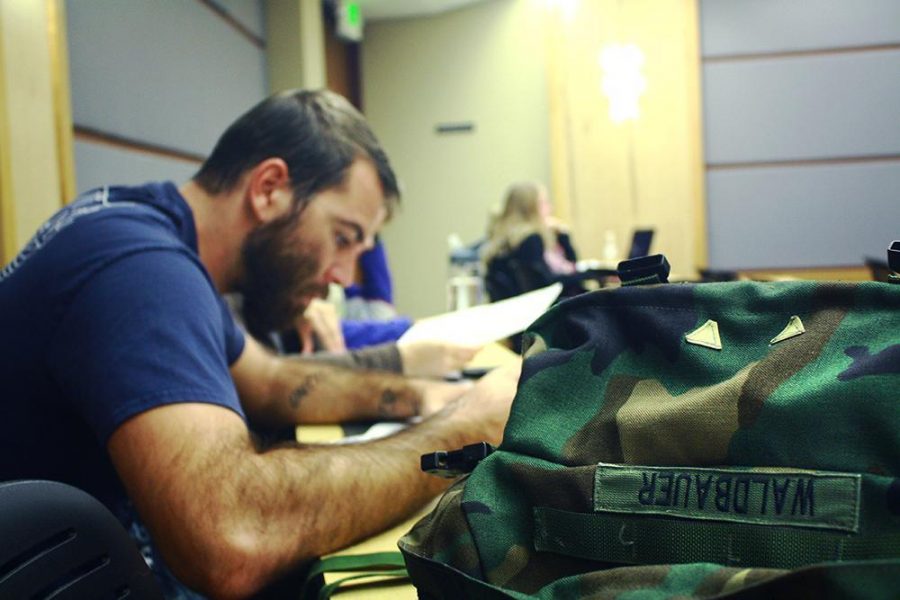 Army veteran Drew Waldbauer attends class on Friday. Waldbauer works at the Adult Learner and Veteran Services center where the goal is to help support the transition, education, and involvement of adult learners and veteran students.