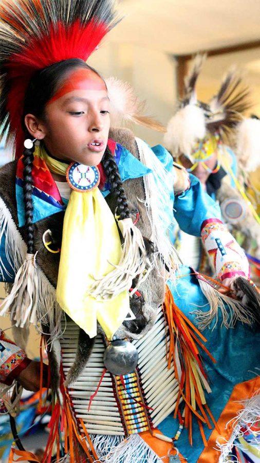 Native dancers perform during the Pow Wow kick off in the Sunken Lounge Friday. The Pow Wow has been running for 30 years.