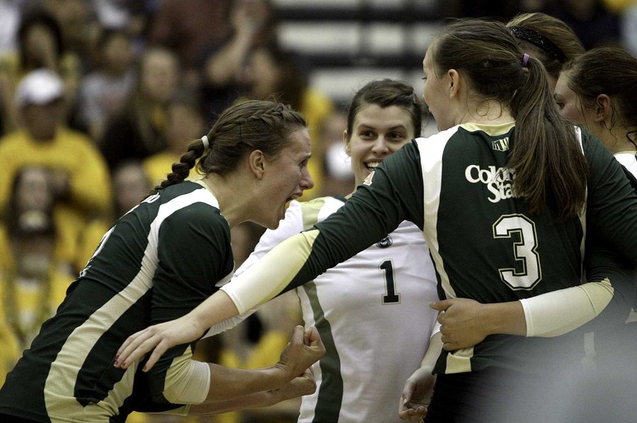 Dana Cranston celebrates after scoring a point during the first game of Saturdays sweep against the Wyoming Cowgirls. The rams swept all three games at the Uni Wyo Sports Complex in front of a sold out Wyoming crowd.