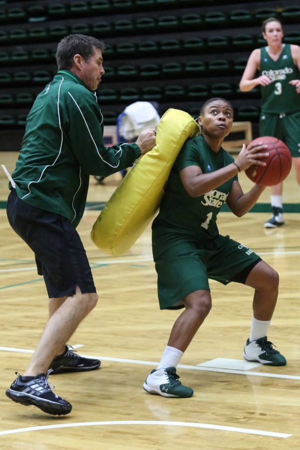 Guard LeDeyah Forte (1) fights through pressure from head coach Ryun Williams during practice Monday afternoon. The Rams are looking for their first win of the season tonight at Moby arena against UNC.