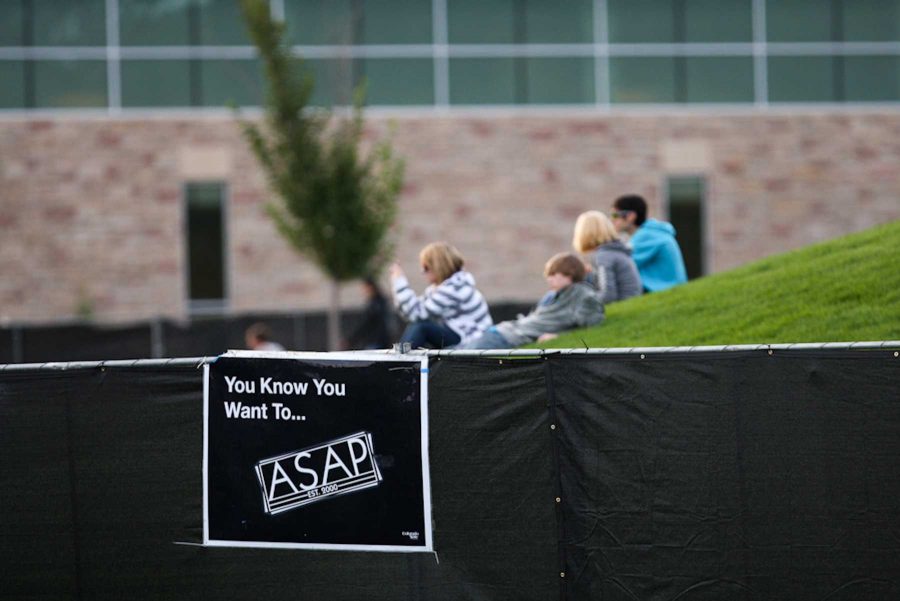 People sit on a nearly empty West Lawn during this year's Fall Concert put on by ASAP. 1,654 people purchased tickets for the Cobra Starship show, resulting in the lowest revenue since the Fall Concert began in 2008.