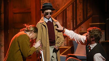 Ralphie, played by Nate Wozniak, is blind in a daydream as his dad, junior theatre major Tim Werth, and   mom, freshman theatre major Annie Booth, wheep to him. A Christmas Story opens tonight at the University Center for the Arts and will run Thursday through Sunday until December 15.