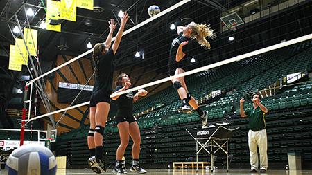 Kaila Thomas goes up for a block against Kelsey Snider at practice on Wednesday. The Rams are gearing up for their big game against Airforce in Colorado Springs on Thursday.