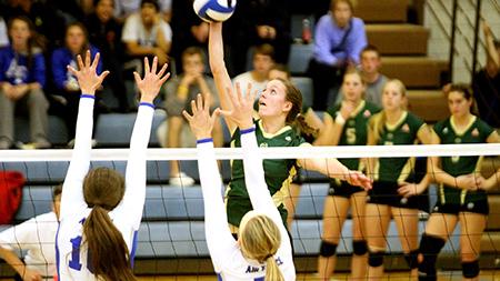 Dana Cranston (2) goes up for a kill during the volleyball game at Air Force Thursday night. The Rams swept the Falcons in three sets.