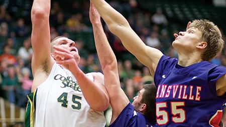 Colton Iverson, 45, right, tries for a layup against Evansville in Moby Arena Saturday afternoon. Iverson is in his only season of eligiblity at Colorado State and is a two-time Mountain West Player of the Week.