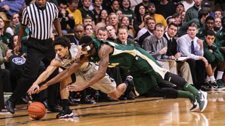 Colorado State forward Greg Smith (44) lunges for a loose ball against Colorado guard Askia Booker (0) during the first half of Wednesday nights game in Boulder.