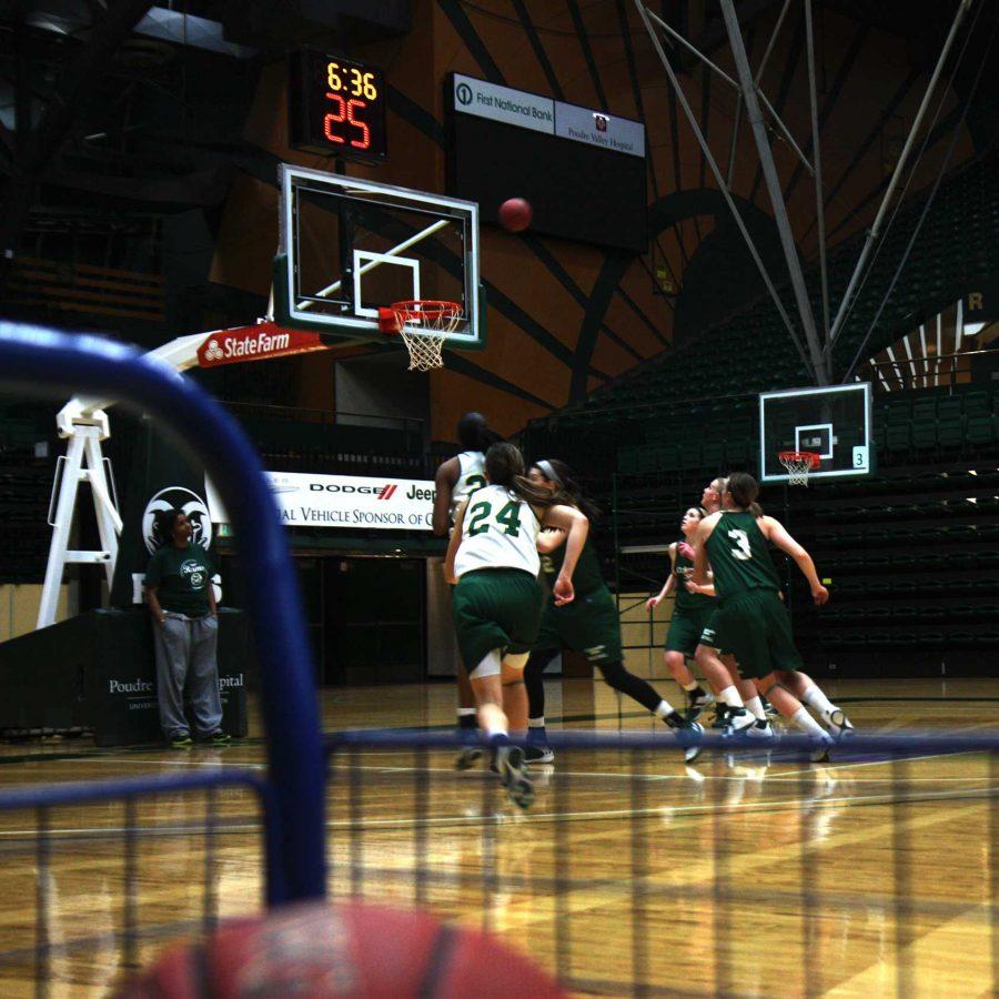 CSU basketball players bound down the court towards a flying ball aimed at the basket. The women's basketball team push hard during practice on Tuesday to prepare for their upcoming game this weekend.