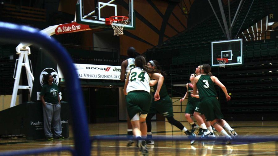 CSU basketball players bound down the court towards a flying ball aimed at the basket. The women's basketball team push hard during practice on Tuesday to prepare for their upcoming game this weekend.