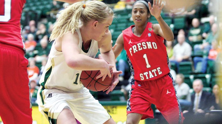 Meghan Heimstra (11) snags a rebound against the Fresno State Bulldogs Sunday afternoon at Moby.