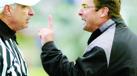 Head coach, Steve Fairchild, waves his finger at Dan Romero in a fit of rage after the head referee failed to make a penalty call on Oct. 11 at Hughes Stadium.