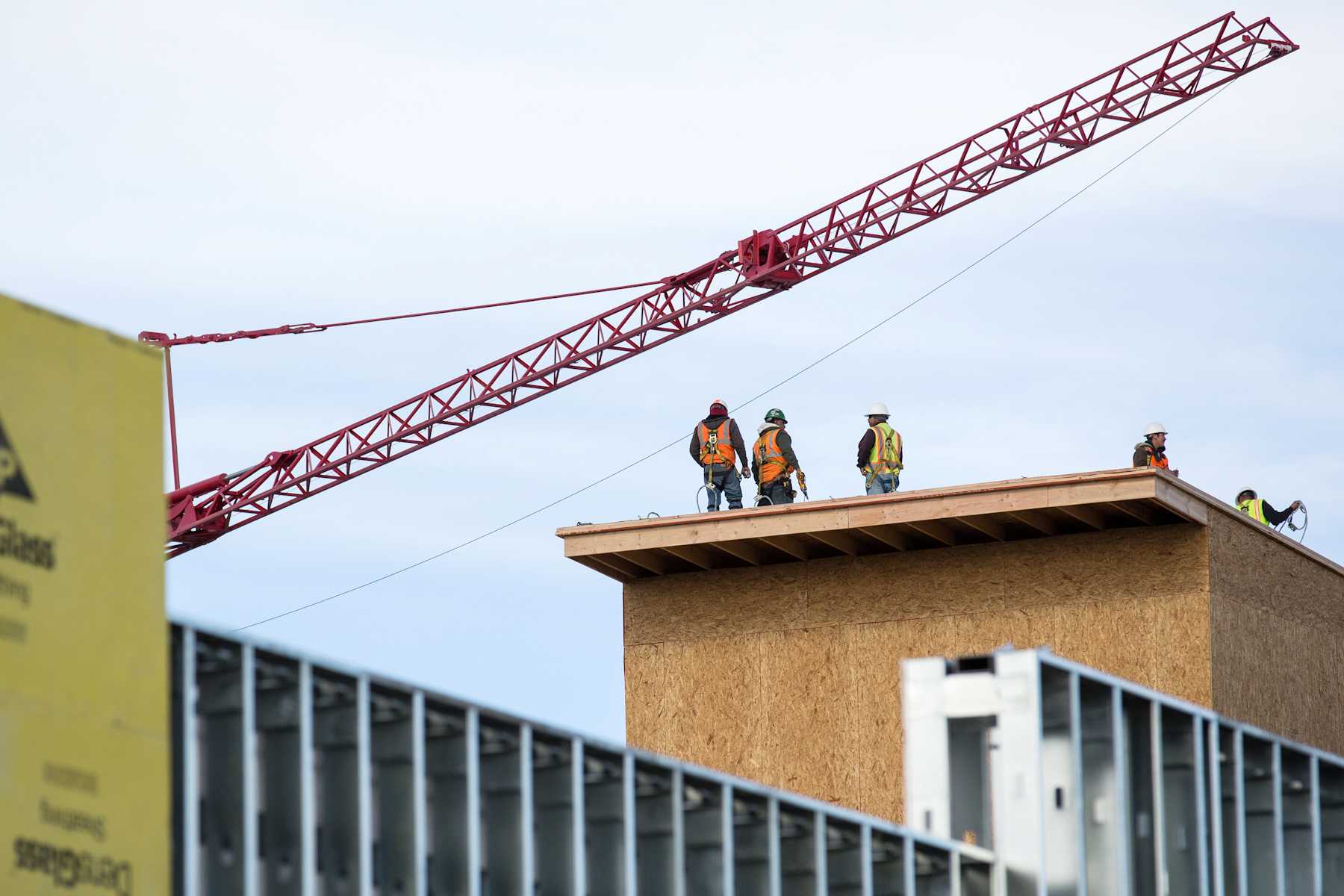 A constuction crew works on the roof of the new student apartment complex, The Summit, on the corner of College Ave. and Prospect St. The complex is expected to be completed in summer of 2012 and is apart of a plan to increase the student housing in Fort Collins.