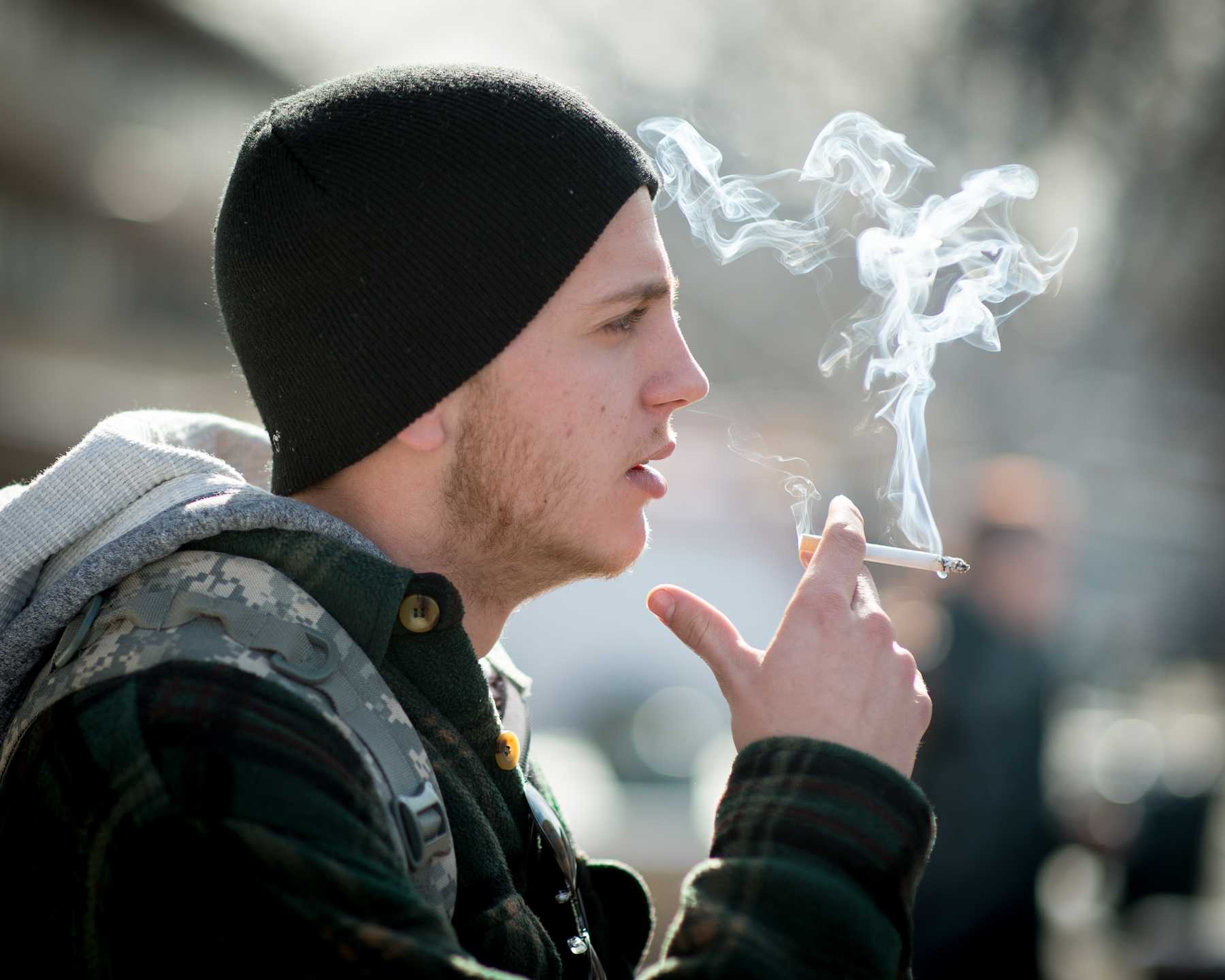 Sophomore business marketing major Ben Miller takes a smoke break outside of Clark A during lunchtime. CSU student government has been discussing a campus-wide smoking ban for over 2 and a half years.