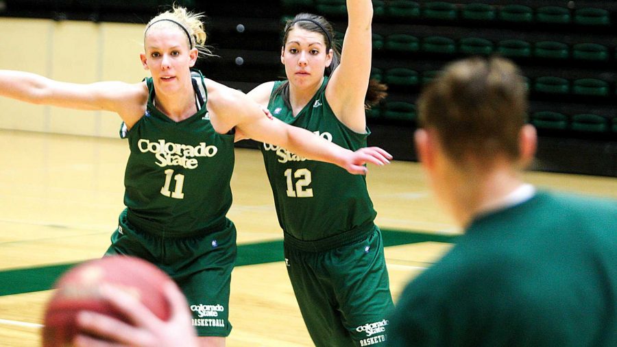 Sam Martin (12) defends Meghan Heimstra (11) at practice on Monday in Moby Arena. The Rams prepare to take on Nevada in Moby Arena at 7 Wednesday night.