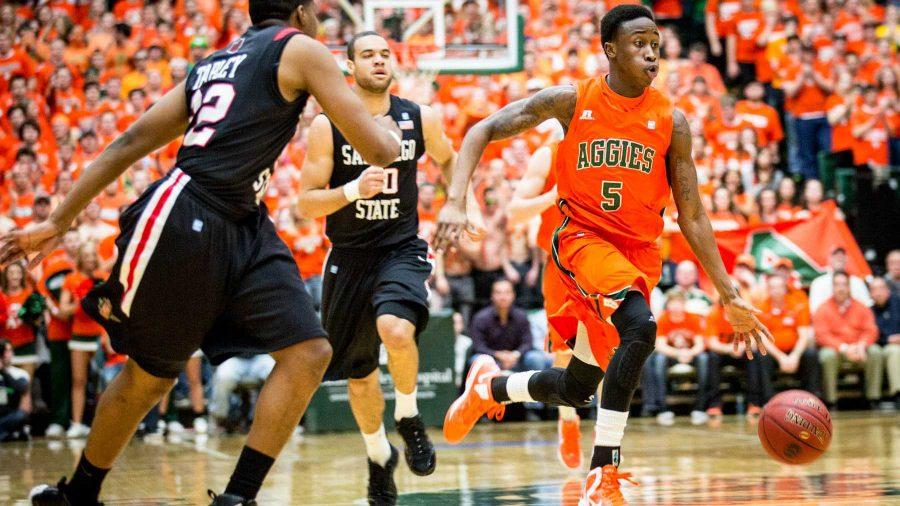 Redshirt sophomore Jon Octeus runs the fast break for the CSU basketball team Wed. against San Diego State. Octeus made a clutch three pointer and sealed the victory with an emphatic dunk.