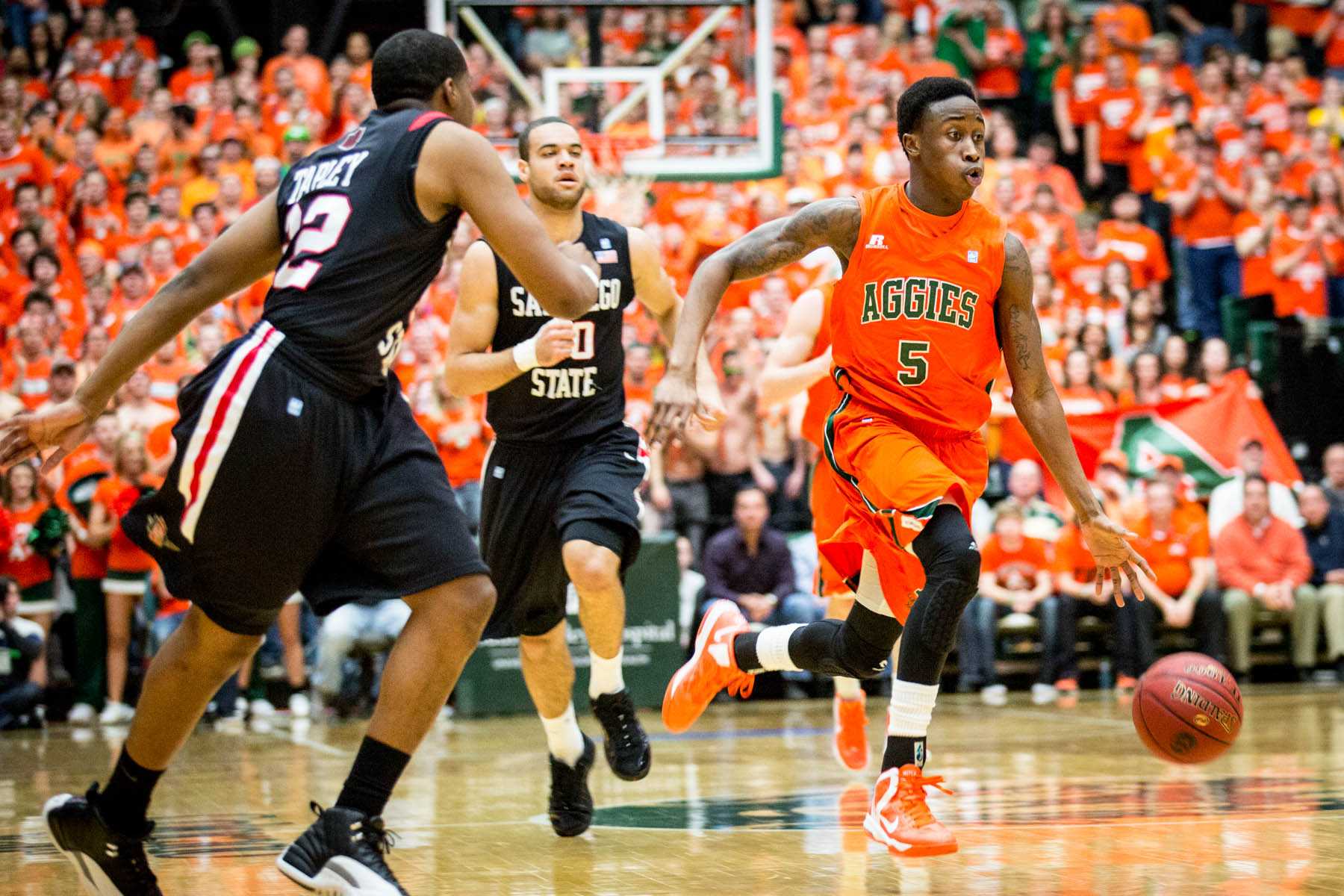 Redshirt sophomore Jon Octeus runs the fast break for the CSU basketball team Wed. against San Diego State. Octeus made a clutch three pointer and sealed the victory with an emphatic dunk.