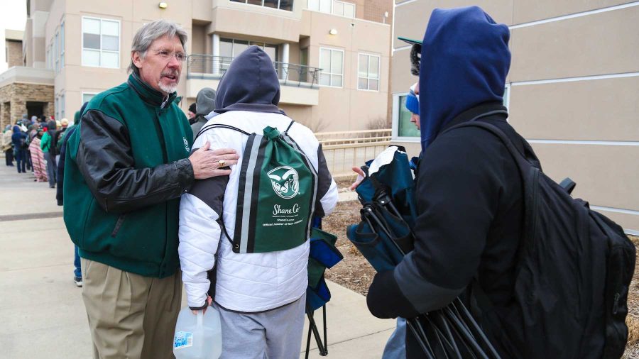 Colorado State athletic director Jack Graham thanks students for their devotion to the basketball program by waiting through the cold for tickets outside of Moby Arena Wednesday morning. Students began lining up as early as Tuesday night to be one of the first to grab their free ticket to Saturday's home matchup against New Mexico.