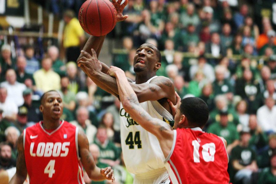 Senior forward Greg Smith, 44, fights to the basket at the CSU men's basketball game against ranked New Mexico in Moby Saturday. Tonight the Ram will play Fresno State in Moby Arena at 7 p.m.