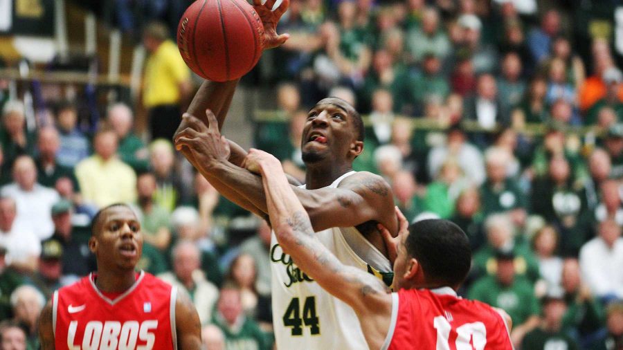 Senior forward Greg Smith, 44, fights to the basket at the CSU men's basketball game against ranked New Mexico in Moby Saturday. Tonight the Ram will play Fresno State in Moby Arena at 7 p.m.