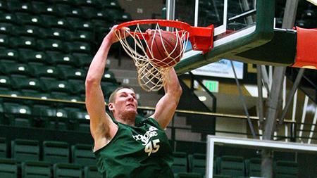 Senior center Colton Iverson dunks at practice Thursday afternoon. The Rams are preparing for their upcoming game at Boise on Saturday.