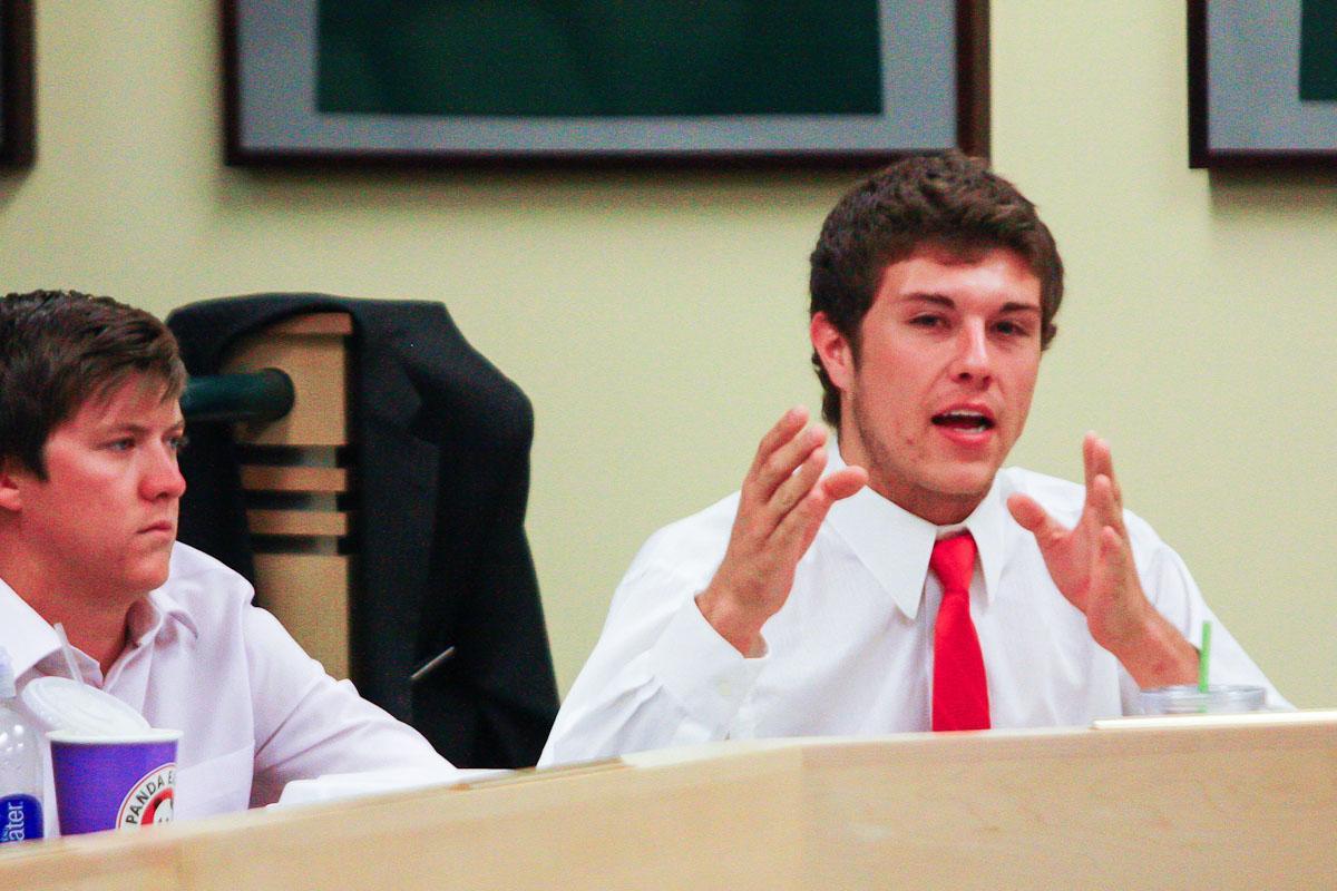 Robert Duran, right, Chief of Staff for ASCSU, speaks at the senate meeting in October in the Senate Chambers of the Lory Student Center. Duran graduated in 2012, but still holds his position as Chief of Staff at ASCSU.