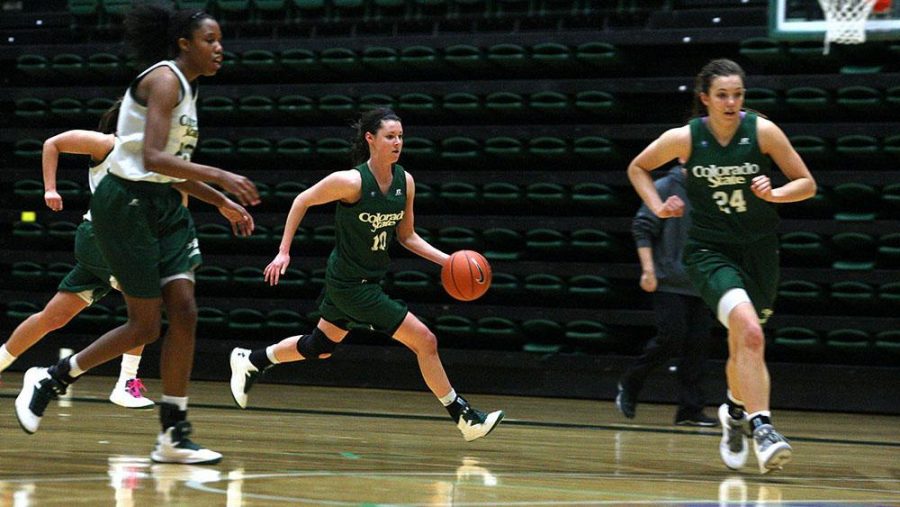 Freshman Emily Johnson runs towards the net to set up for a shot at practice on in Moby. On Thursday night the Rams will play Wyoming at 9:35 p.m. in Las Vegas for at the Mountain West Tournament.