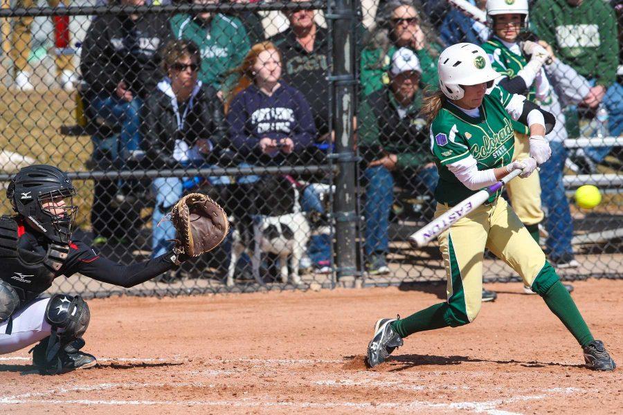 Cassie Mosser (21) hits the ball during Saturday's game against Nebraska Omaha at Ram Field during the Colorado State Classic Tournament. The Rams fell to the Maverics 3-2 in extra innings.
