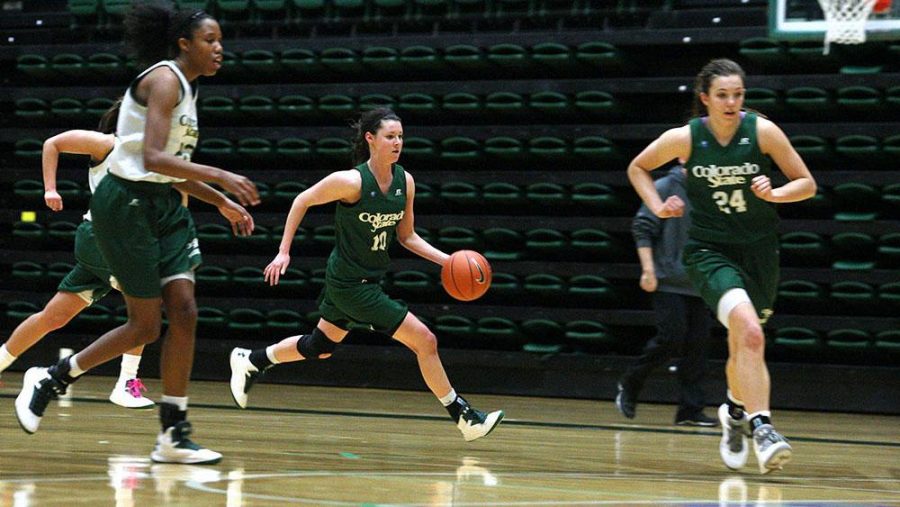 Freshman Emily Johnson runs towards the net to set up for a shot at practice on last week in Moby. Tonight the Rams play Wyoming in Moby at 6 p.m.