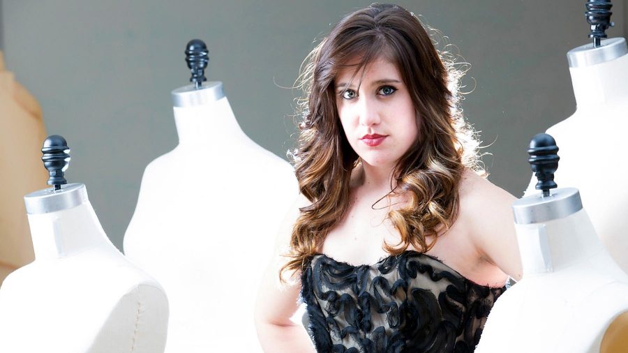Tatum Butnett models a dress that will appear in Friday's fashion show put on by CSU Fashion Group International.