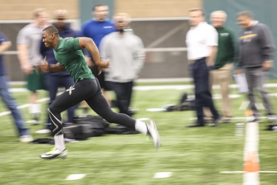 Senior wide reciever Dominique Vinson runs the 40 yard dash during yesterdays Pro Day in the Indoor Practice Facility. Dominique and 7 other Ram seniors gave their best in front of NFL scouts in hope of being drafted for the upcoming season.