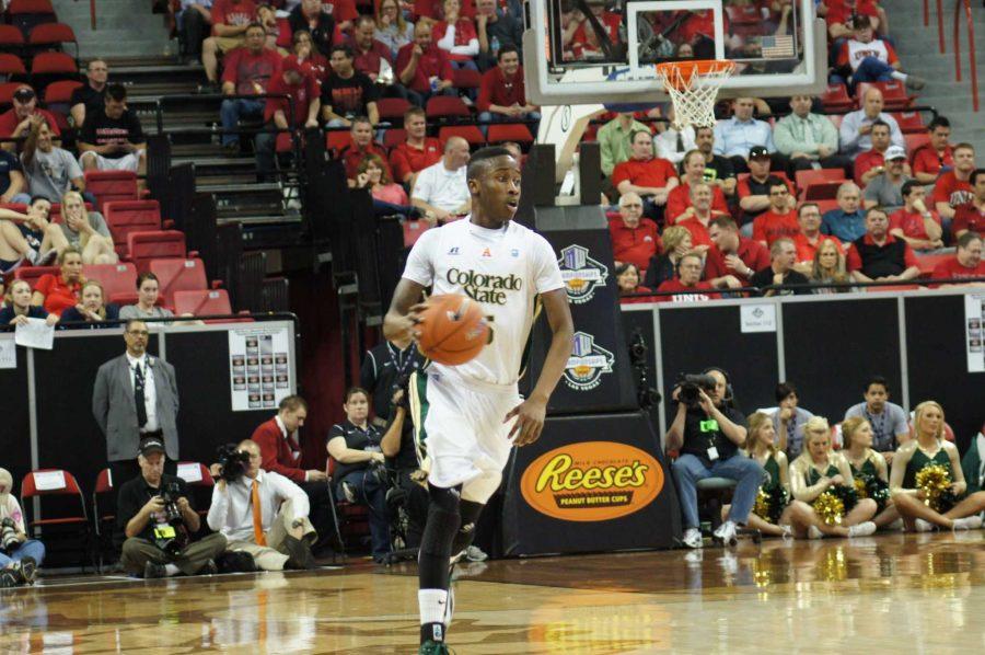 CSU guard Jon Octeus brings the ball up the floor against Fresno State in the Mountain West championships.