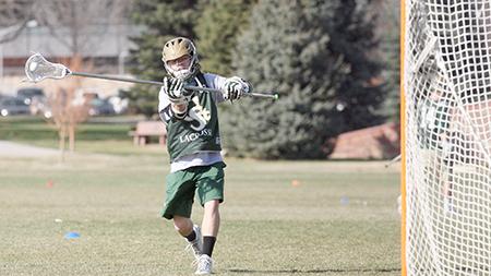 Eric Uhl (33) shoots around during Mens Lacrosse practice Wednesday afternoon. CSU Mens Lacrosse plays BYU on Friday in Utah.