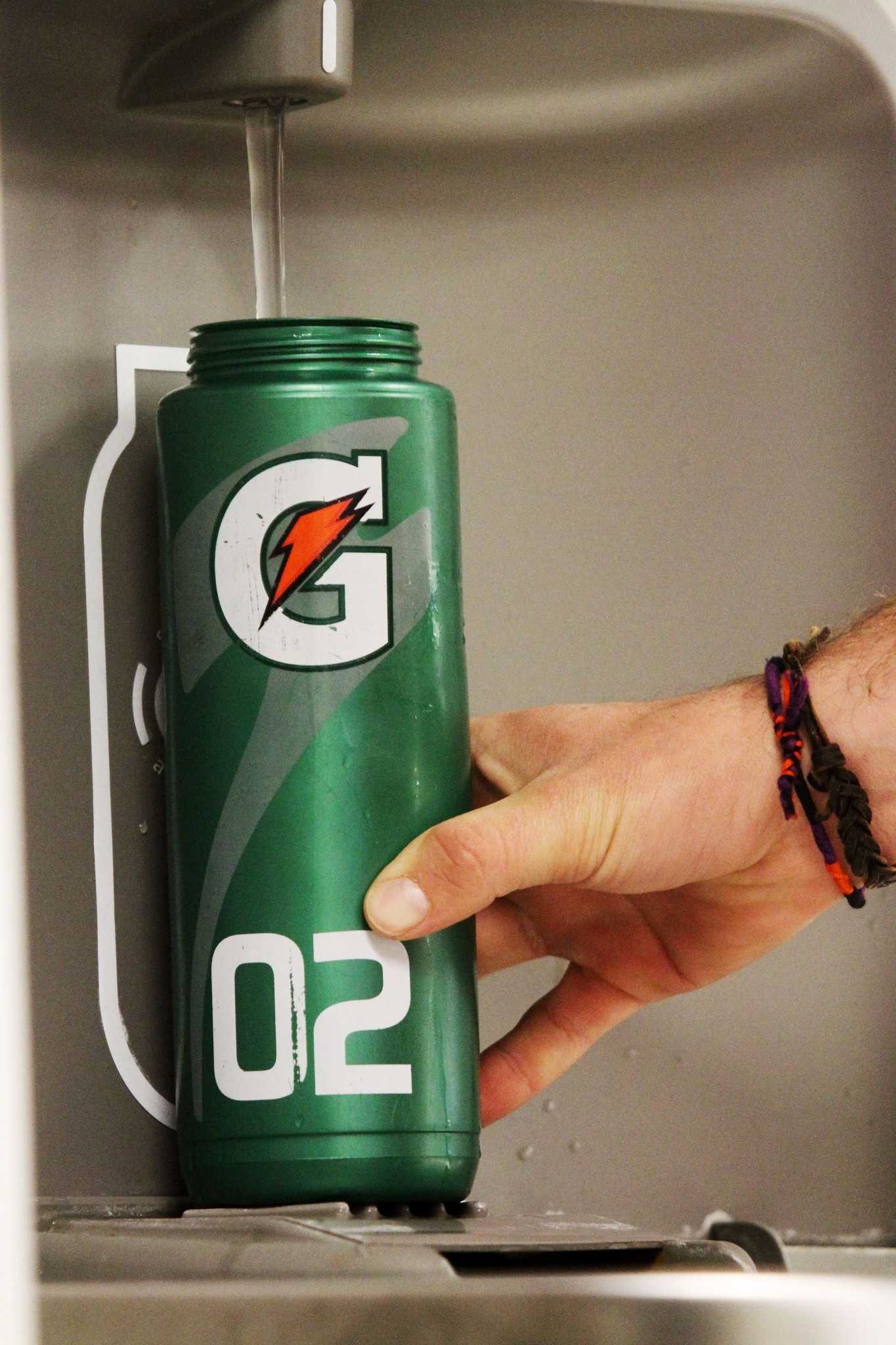 Junior Health and Exercise Science major Zack Zeilik fills up his reusable water bottle in the Library Sunday. There is a group on campus called Take Back the Tap that encourages students to stop purchasing bottled water in favor of reusable water bottles.