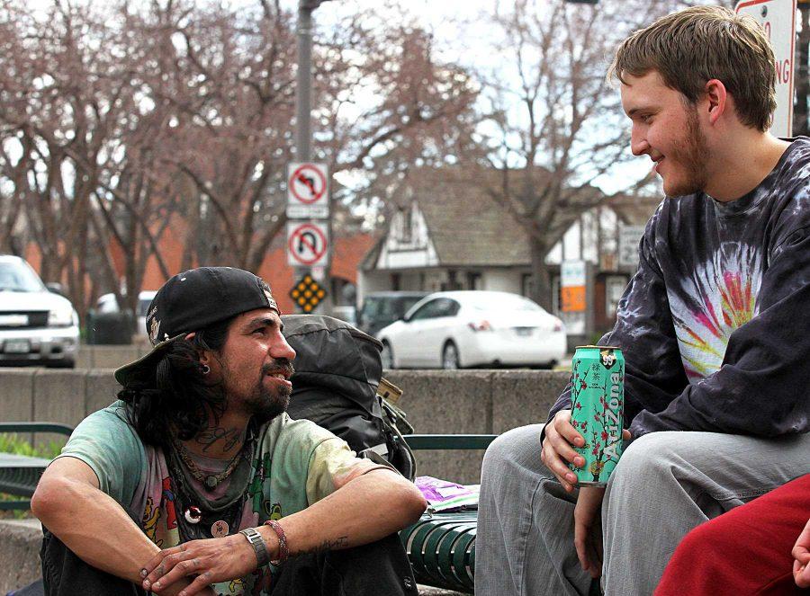 Collegian reporter, Matt Gabriel, talks to a homeless traveler that goes by the name of Fishtaco. Gabriel and another reporter, Cailley Biagini, went undercover on a Friday afternoon to discover what its like to be homeless in Fort Collins.