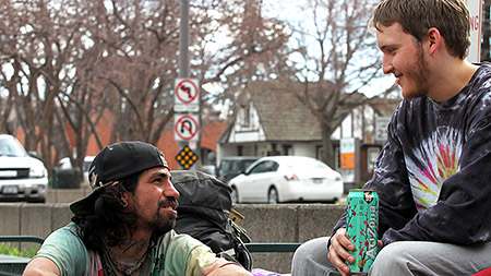 Collegian reporter, Matt Gabriel, talks to a homeless traveler that goes by the name of Fishtaco. Gabriel and another reporter, Cailley Biagini, went undercover on a Friday afternoon to discover what its like to be homeless in Fort Collins.
