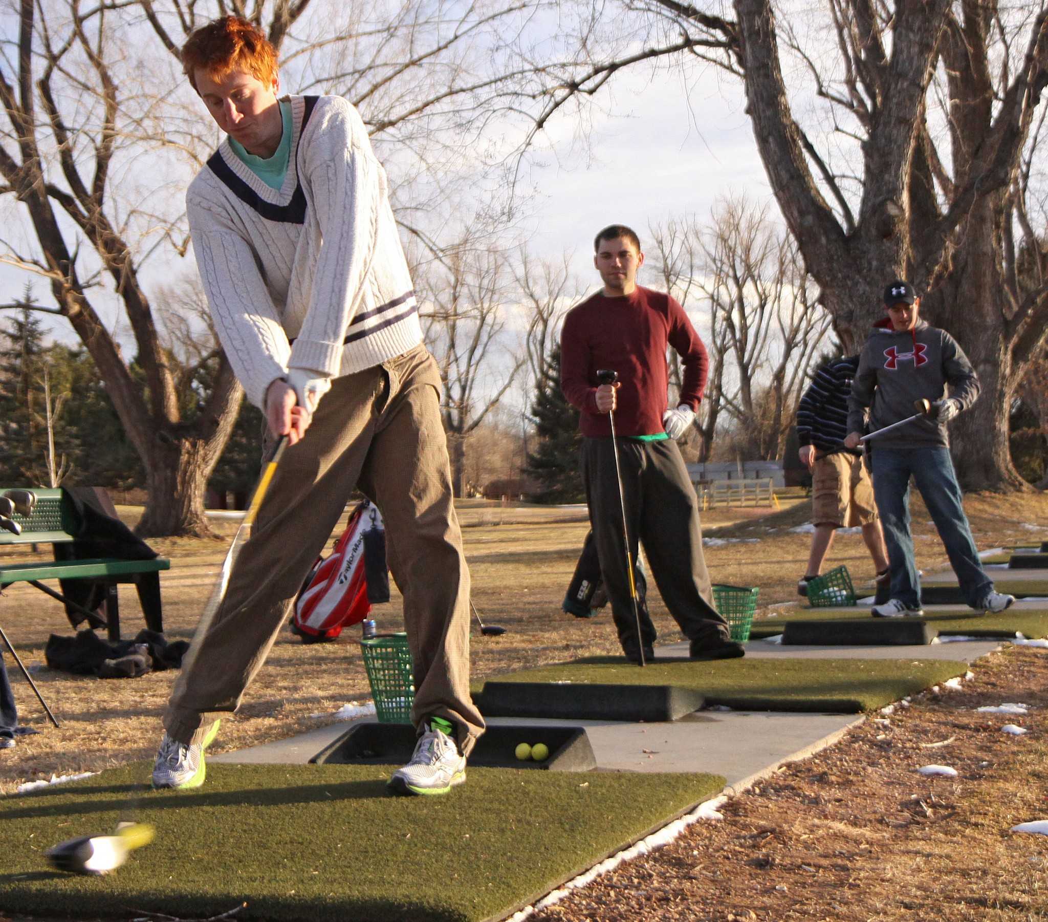 Colorado State graduate Drew Harris drives a ball at the City Park. The City Park golf course may be closed and demolished, possibly being replaced by a manufacturing plant.