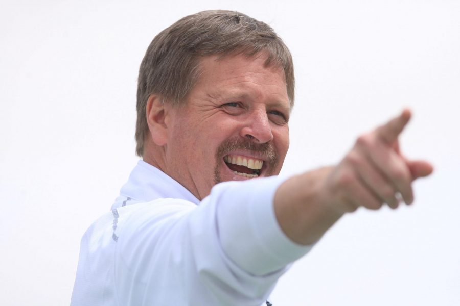 Head Coach Jim McElwain acknowledges some fans in the stands at Hughes Stadium during the CSU Spring Game Saturday.