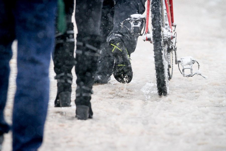 Students flee campus after Colorado State closes at noon on April 17, 2013 as a result of heavy snow accumulation and a forecast for more. (Photos by Hunter Thompson)