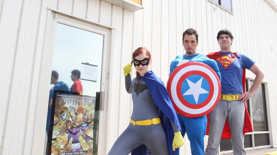 (From left) Taylor Ley-Leddy, Zak Bruhin, and Andrew Ricciardi don their costumes for the upcoming comic-con in front of NEw Genesis Comics in Fort Collins on Sunday afternoon. Comic-con will be in Denver from May 31 - June 2.