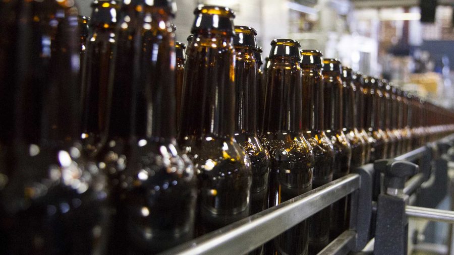 Bottles wait on the bottling line to be filled at Odell Brewing Company on Wednesday afternoon.