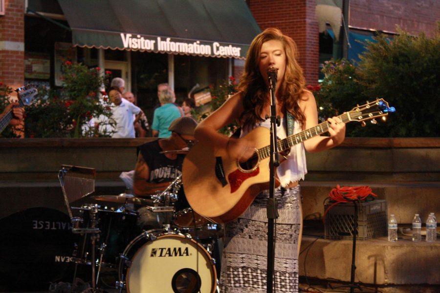 Lexi Shaney, an indie singer songwriter, performs Friday June 14 in Old Town Square as part of the Ben and Jerry’s FAC Concert Series. The concert series occurs Fridays through Aug. 30. Photo by Logan Martinez